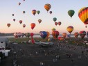 Balloons rising into the Morning sky at the Adirondack Balloon Festival Balloons rising into the Morning sky at the Adirondack Balloon Festival